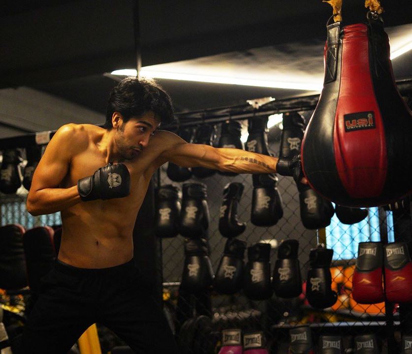 Rohit Raaj practising boxing at a gym