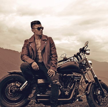 Sangay Tsheltrim with his Harley Davidson