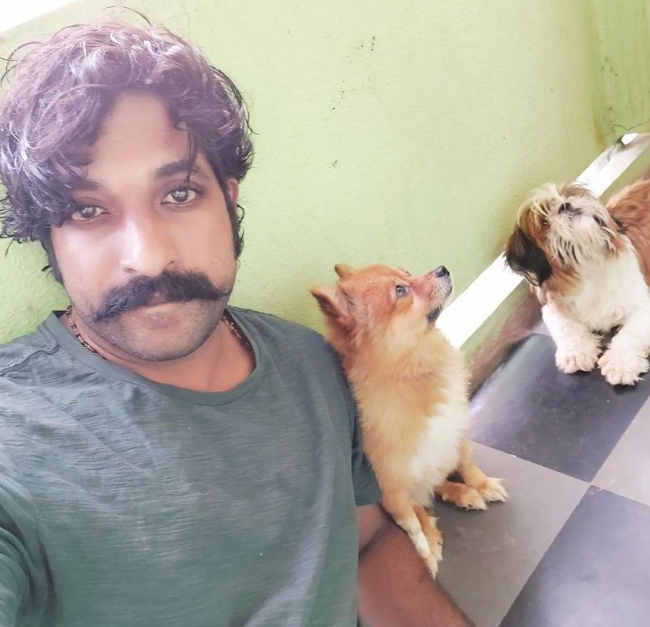 Sanjay Krishna Makthala with dogs