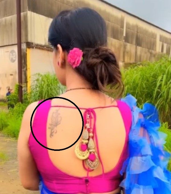 Sapna Sikarwar's tattoo on the left side of her back