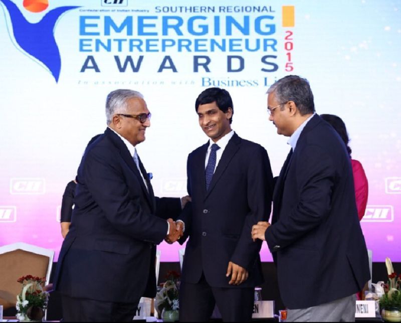 Srikanth Bolla (centre) receiving Emerging Entrepreneur of the Year by CII