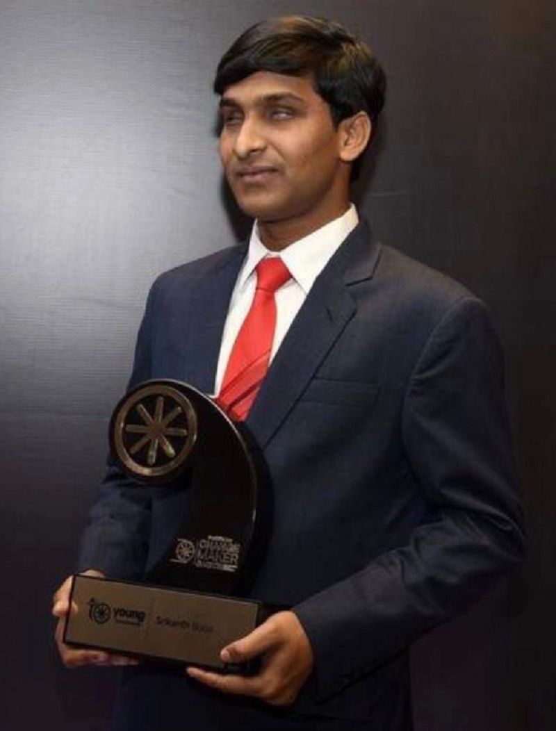 Srikanth Bolla posing with Young Global Leaders Award
