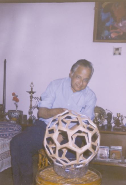 Subramania Ranganathan with an origami model of a 'buckyball' that he crafted