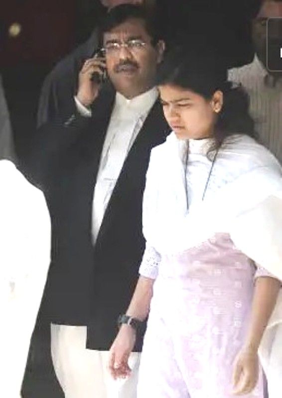 Ujjwal Nikam with Poonam Mahajan, daughter of Pramod Mahajan, outside the court premises