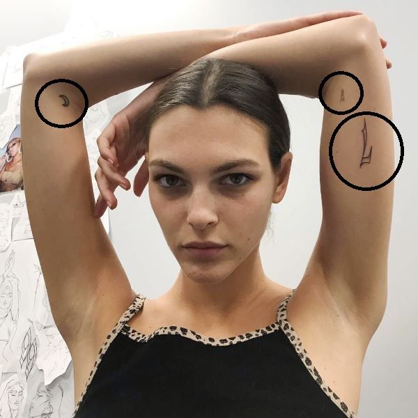 Vittoria Ceretti's tattoo's on her arms
