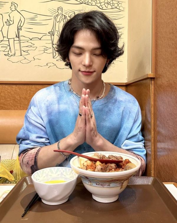 Woojin having a non-vegetarian meal