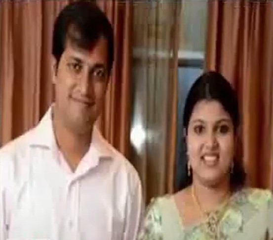A photo of Anupam Agrawal with his spouse