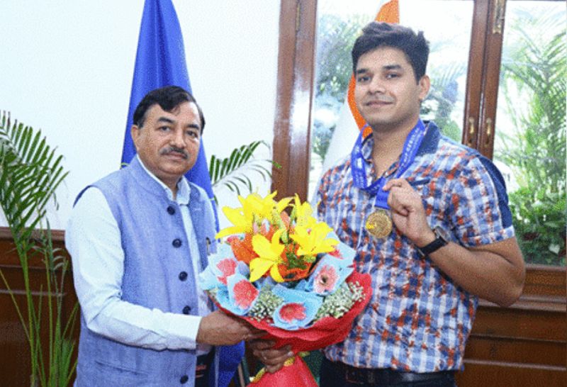 Abhishek Verma being felicitated by the chairman of the Central Board of Direct Taxes