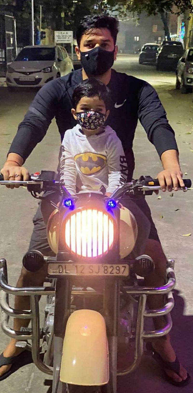 Abhishek Verma with his son posing on his bike