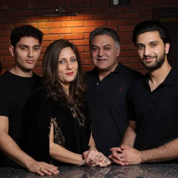 Ahad Raza Mir (extreme right) with his family