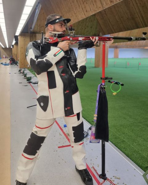 Akhil Sheoran shooting his rifle at the 19th Asian Games in Hangzhou, China