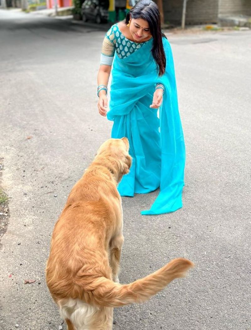 Akshitha Bopaiah with a dog