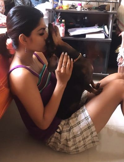 Ananya S Rao with a dog