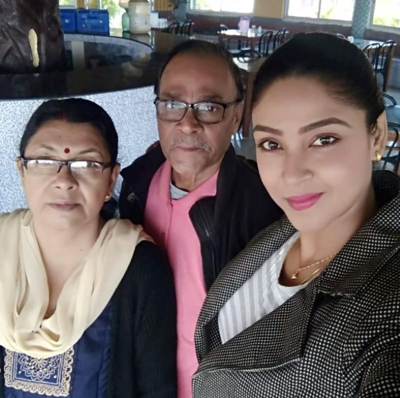 Angana Roy with her parents 
