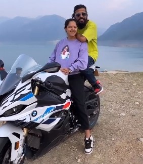 Anurag Dobhal riding BMW S 1000R with her sister