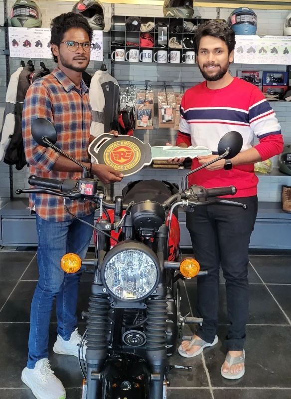 Aravind Seiju (right) with his bike