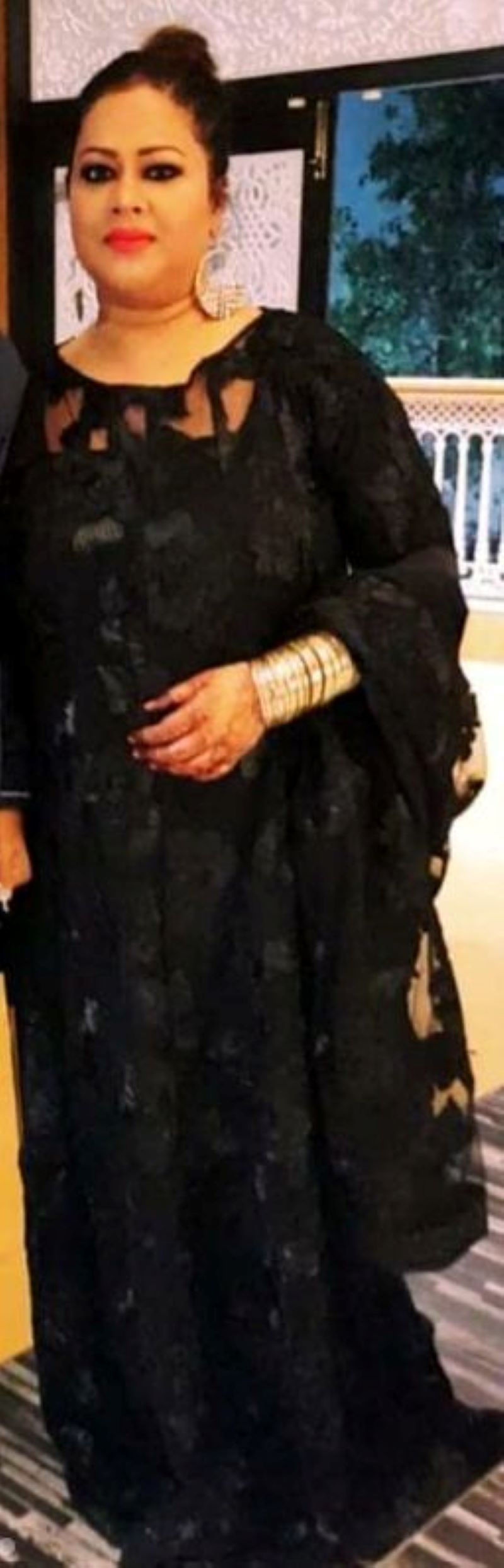 Ayesha I. Darbar standing