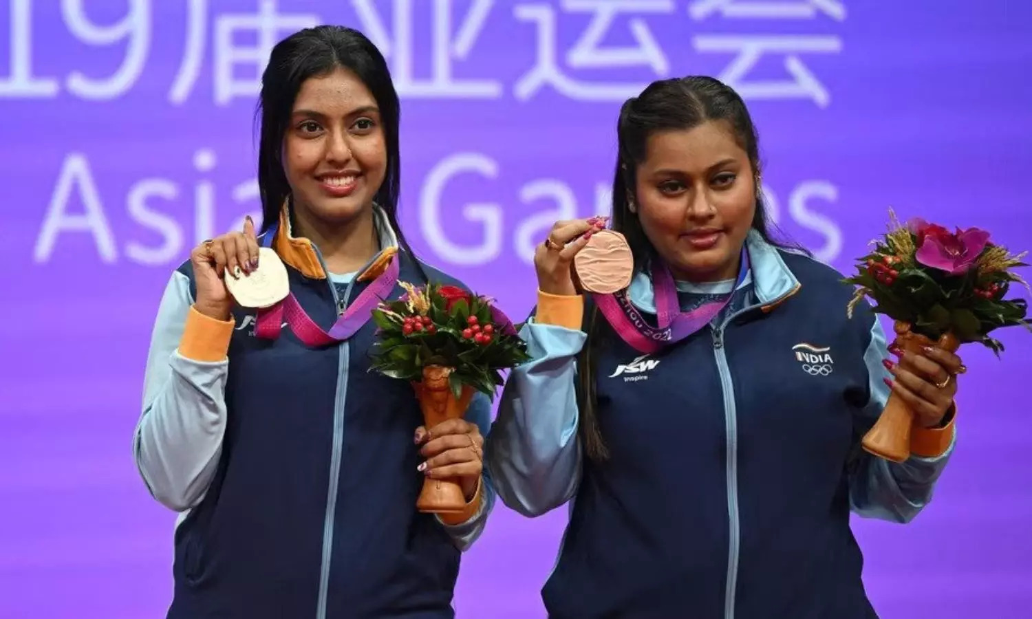 Ayhika Mukherjee and Sutirtha Mukherjee after receiving their medal at Asian Games Championship, 2023
