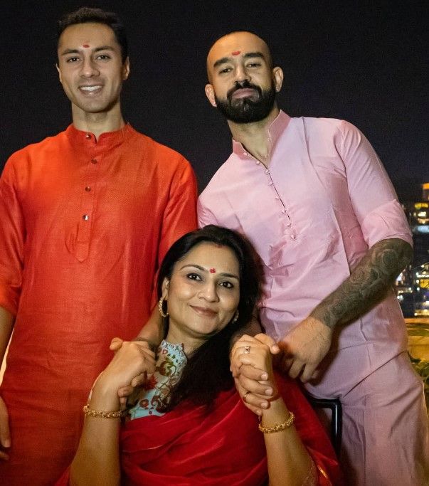Dhruv Barman with his brother and mother