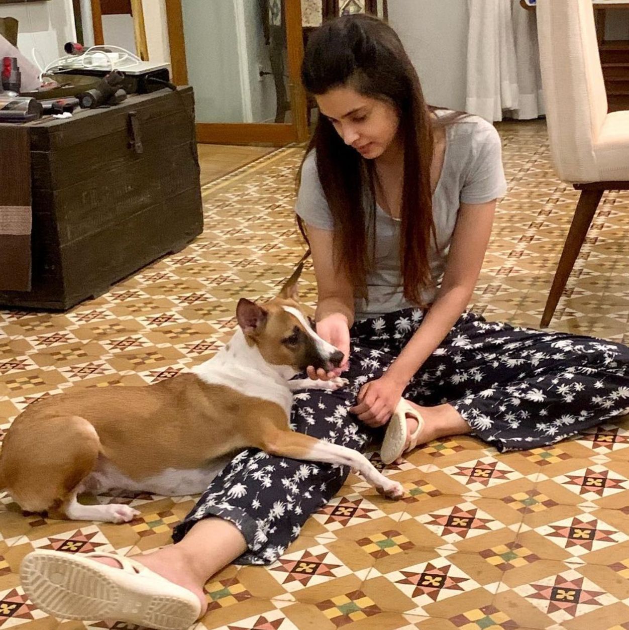 Diana Penty playing with her pet dog Vicky