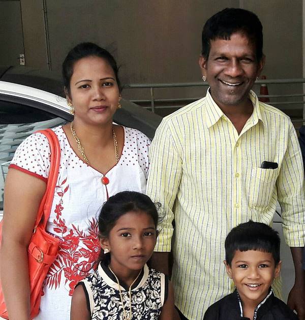 Gana Bala with his wife and children