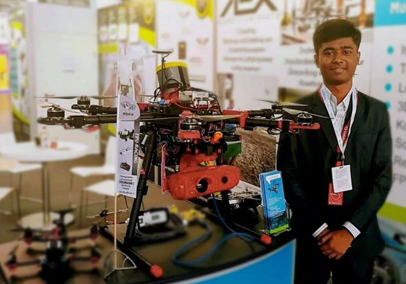Image of Drone Prathap standing next to drone made by BillzEye- Multicoptersysteme