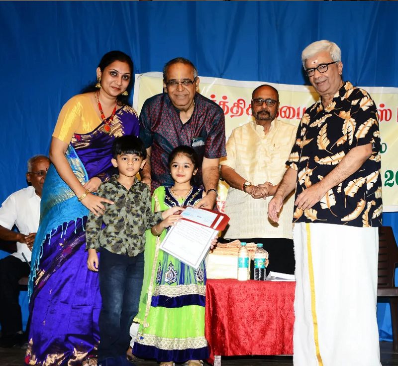 Iyal receiving Best Child Artist Award from Kartik Fine Arts for the play Aval Peyar Sakthi
