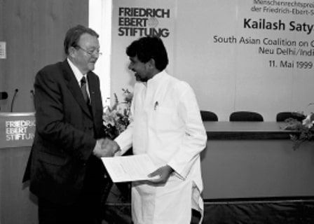 Kailash receiving the Friedrich Ebert Stiftung Award in Germany in 1999