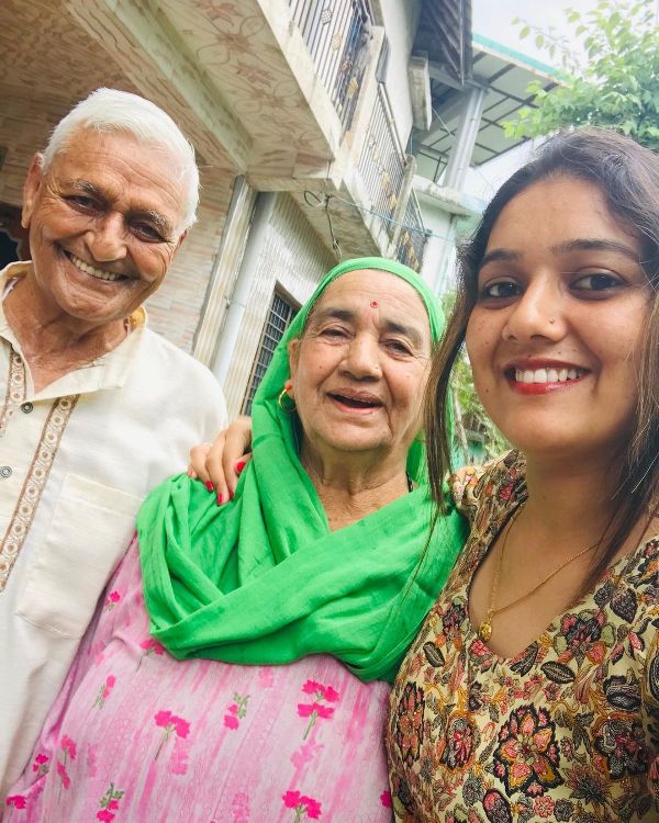 Komal Saklani with her grandparents