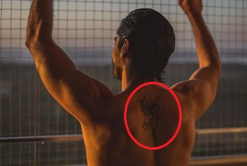 Kunal Thakur's tattoo on back