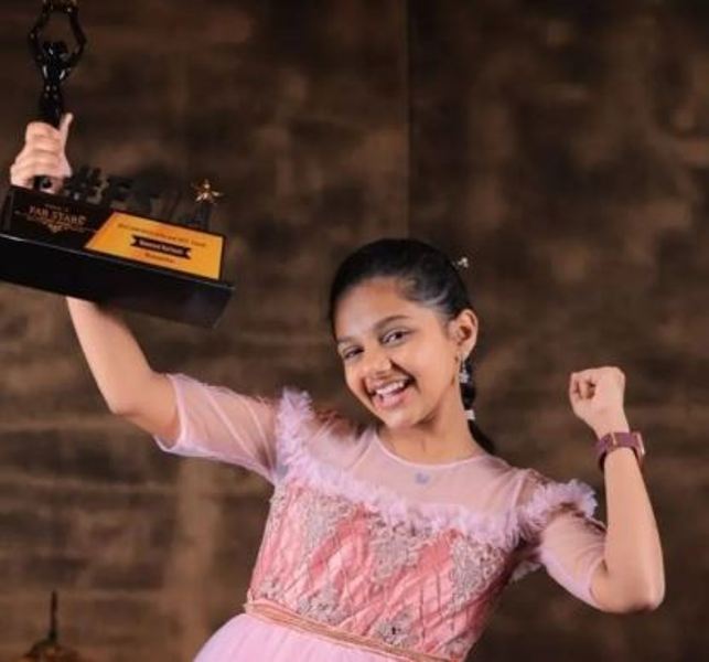 Manasvi Kottachi with the Best child artist award (2022) for the movie Maamanidhan