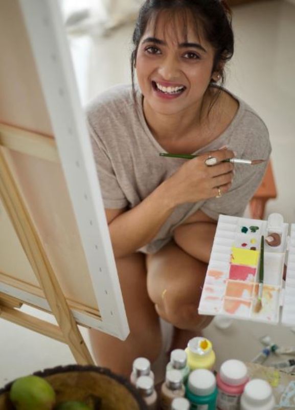Masoom Shankar painting a canvas