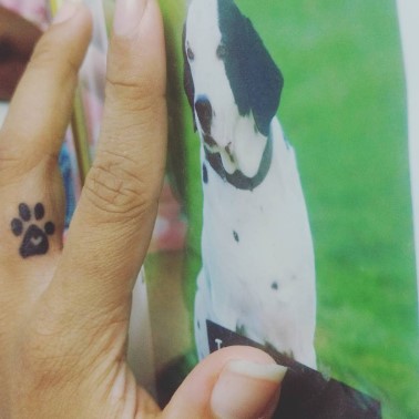 Maya S. Krishnan's tattoo on her left hand's middle finger