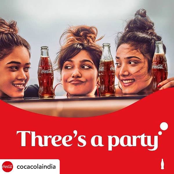 Medha Shankar (rightmost) featured in an advertisement for Coca-Cola