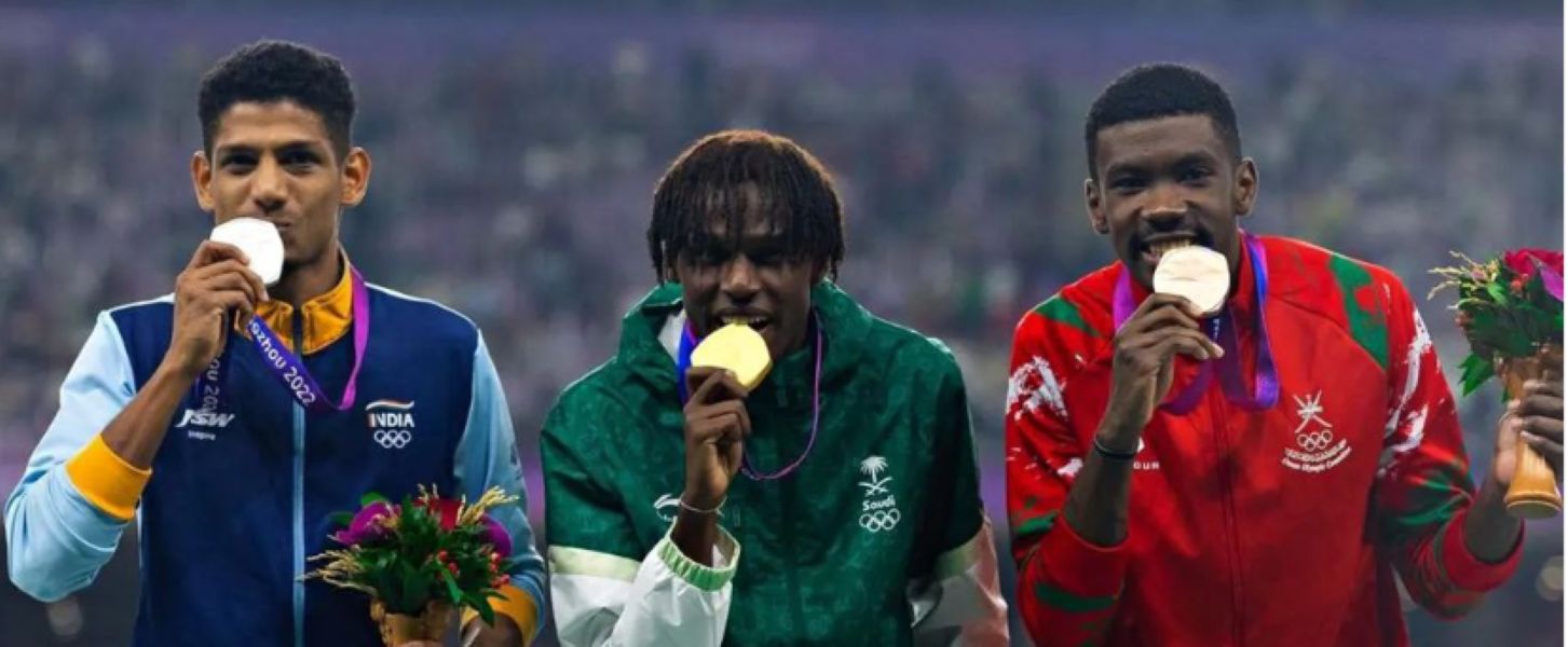 Mohammed Afsal posing with his silver medal along with the gold and bronze medal winners of the men's 800m race at the 2022 Asian Games