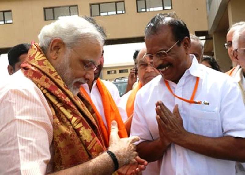Nallu with Prime Minister Narendra Modi during an election rally