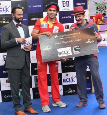 Naman Shaw posing after winning the player of the match title in the Box Cricket League Season 1 (2014)