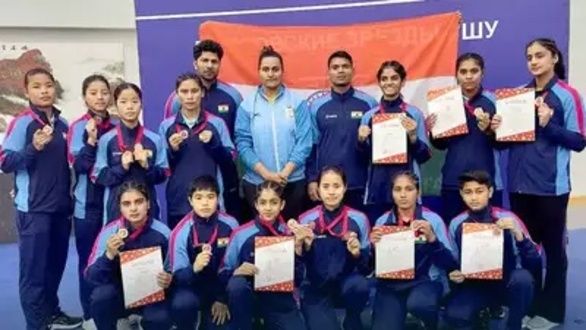 Naorem Roshibina Devi (extreme left standing) after winning the Moscow Wushu Stars Championship in 2023