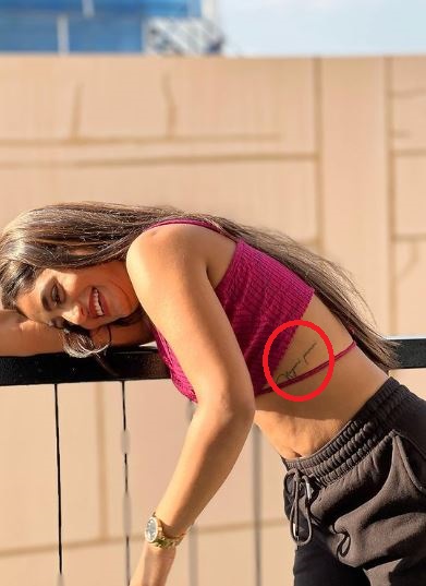 Nayani Pavani tattoo below her ribs