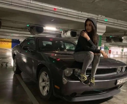 Nivetha Pethuraj with her Dodge Challenger Sports car