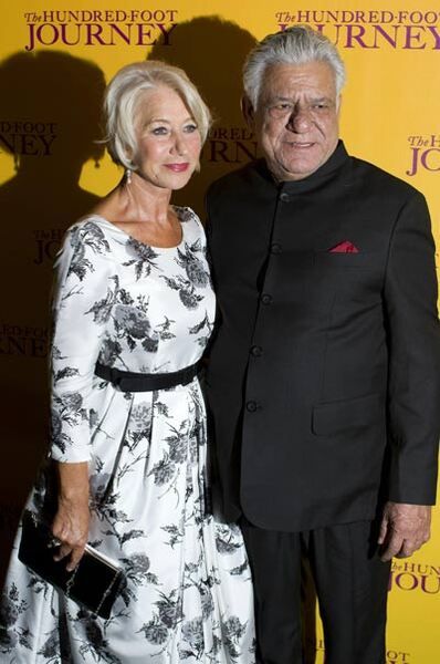 Om Puri (right) with his co-actor Helen Mirren at the promotion of 'The Hundred Foot Journey' (2013)