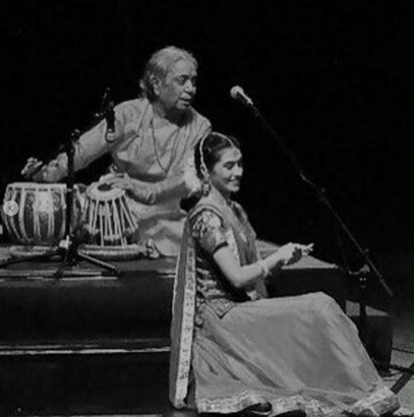 Parakh Madan, along with Birju Maharaj, during a performance