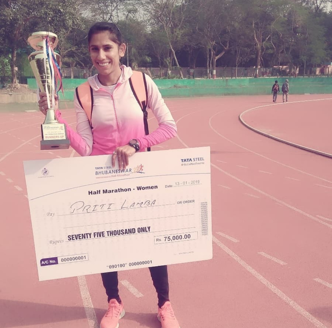 Priti Lamba after her win at the 21 Km half marathon at Kalinga Stadium in Bhubaneshwar in 2019
