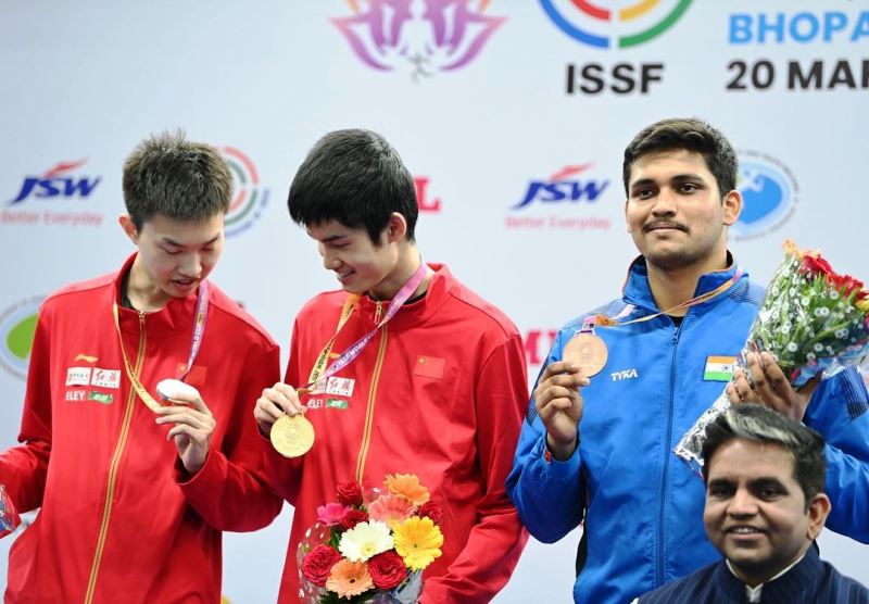 Rudrankksh Patil (rightmost) after winning a bronze medal in the 10m air rifle at ISSF World Cup 2023 Bhopal