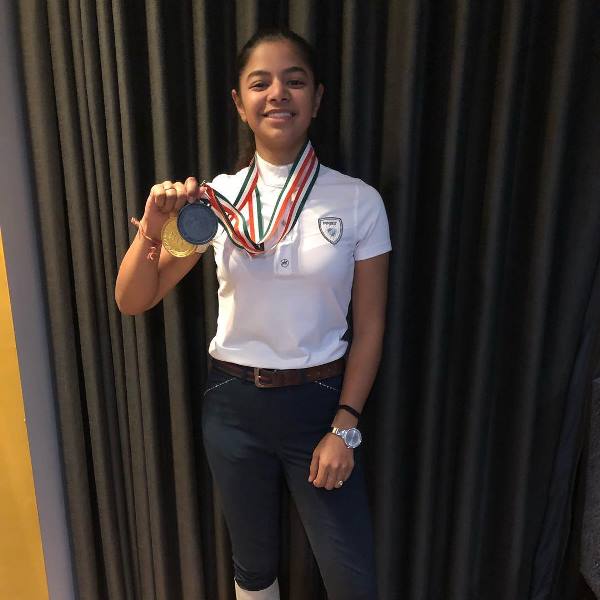 Sudipti with the medals she won at the Junior National Equestrian Championship 2018