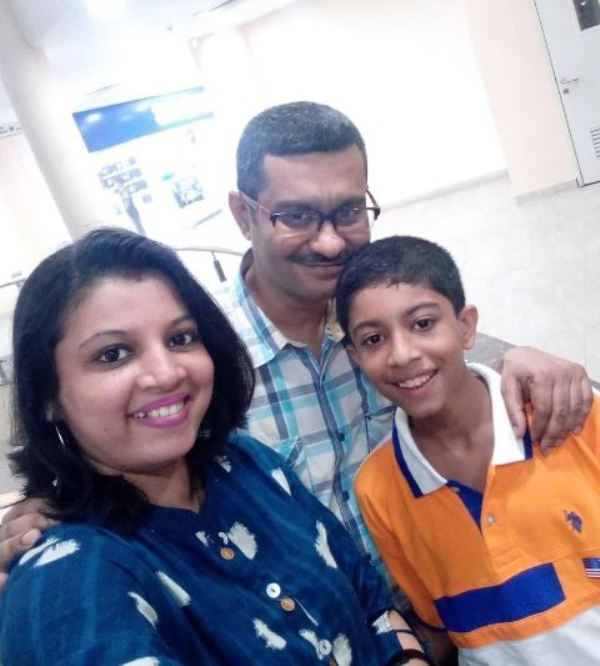 Sumit Mukherjee with his wife, Preeti Mukherjee, and their son.