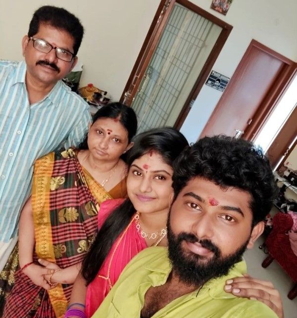 Surya with her parents and brother