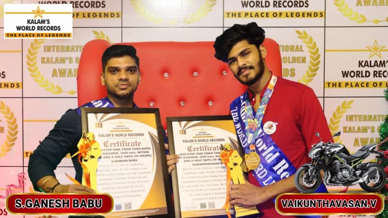 TTF Vasan and S. Ganesh Babu posing with their Kalams World Records Certificate for creating a new world record by riding non-stop from Tamil Nadu to Kashmir 3500 Km within 1 and a half days (39 hours)