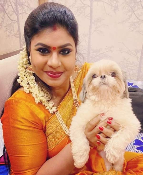 Vichithra with a dog