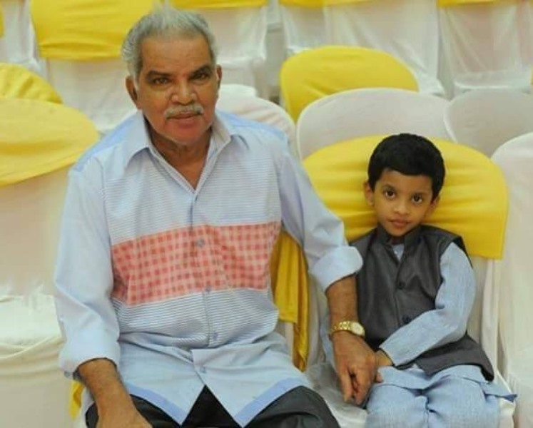 Vinay Forrt's father with his grandson